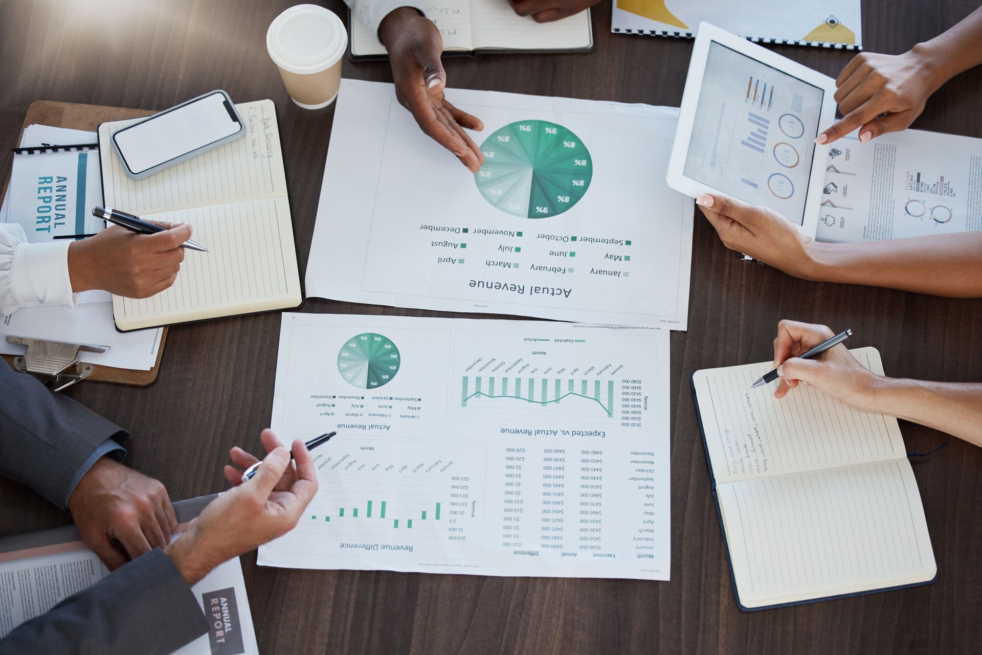 Revenue, finance and hands of business people in meeting planning sales growth ideas for global financial profit increase. Accounting, finance and team of accountants working on company analytics